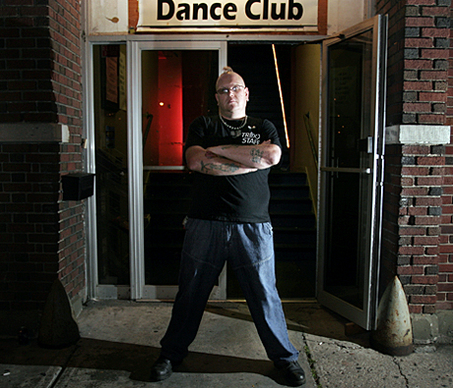 bouncer standing at door